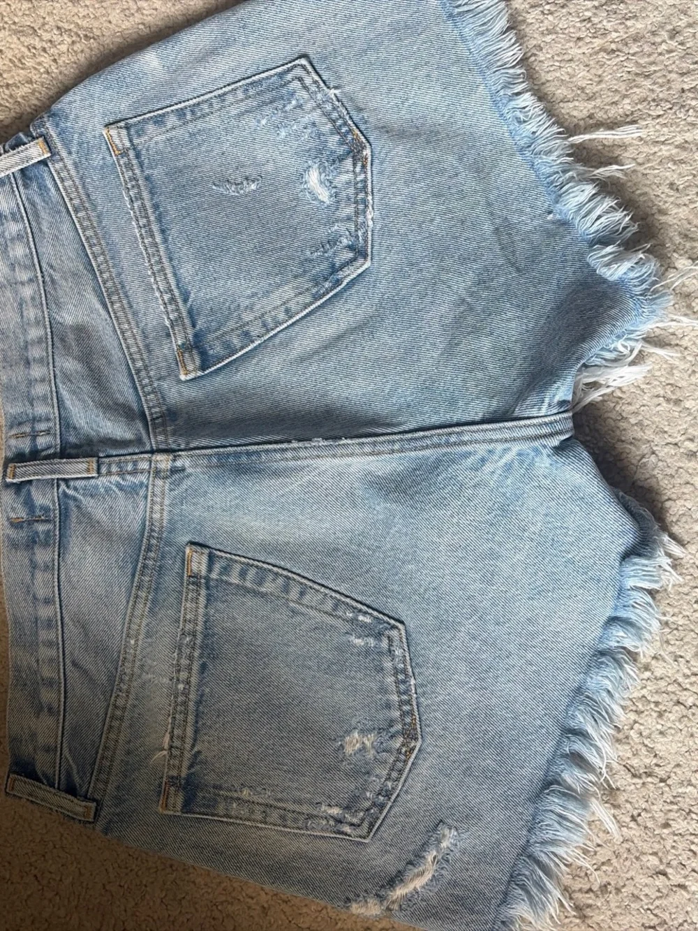 Agolde Light Wash Distressed Denim Cutoff Shorts